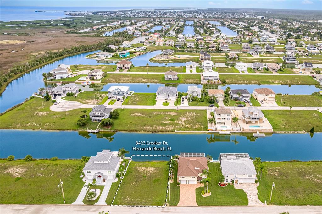 0 Croaker Drive Hernando Beach, FL 34607 - Photo 1 of 1 an aerial view of residential houses with outdoor space