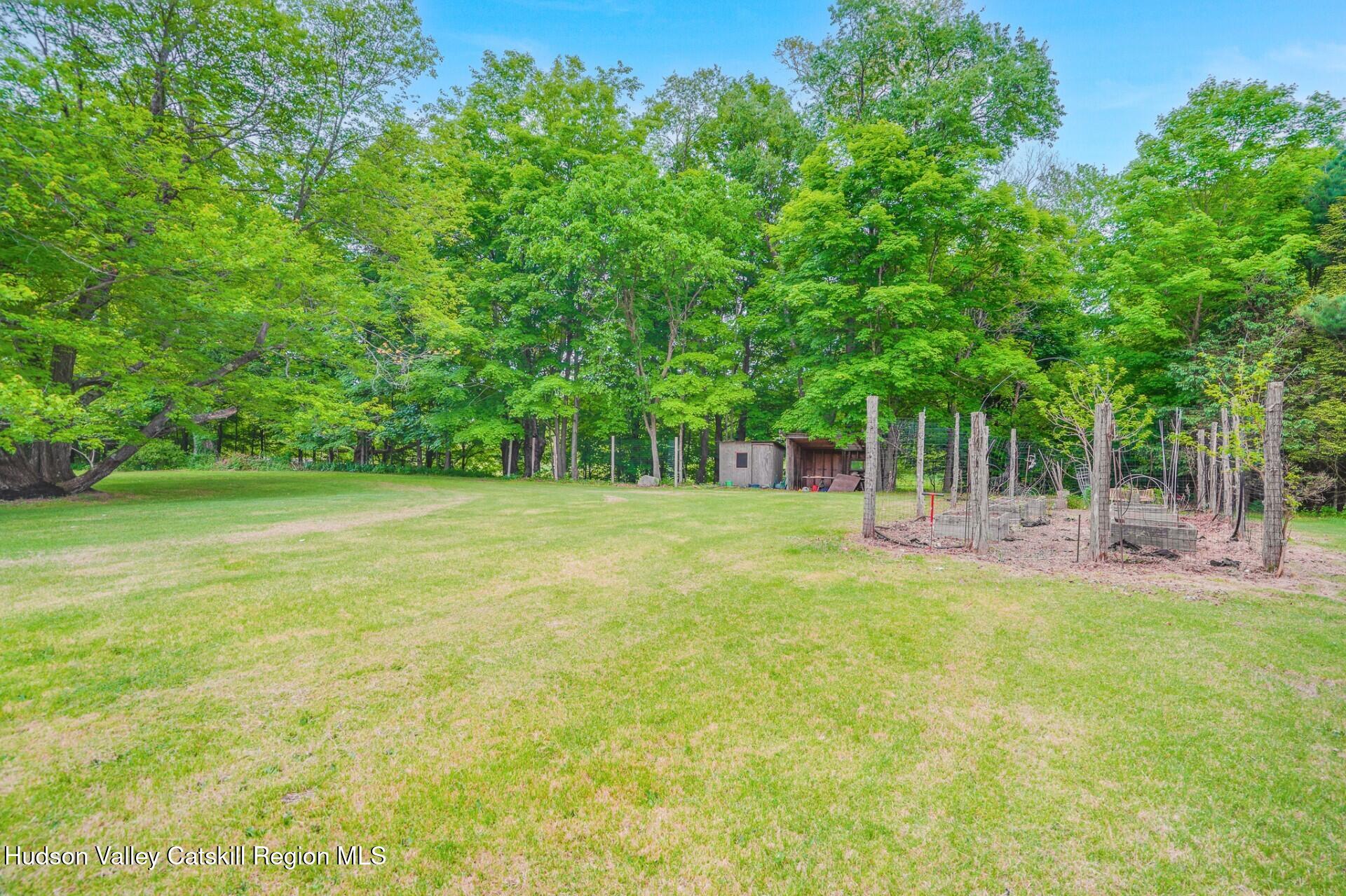 984 Blue Mountain Road Saugerties, NY 12477 - Photo 4 of 24 a view of a house with a backyard