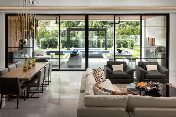 a living room with furniture and a window