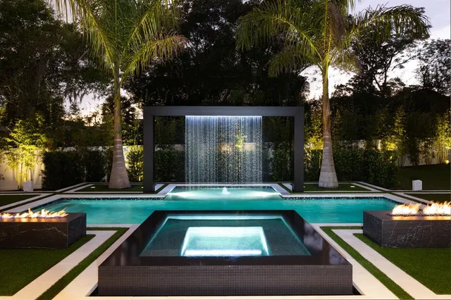 a view of a yard with large tree