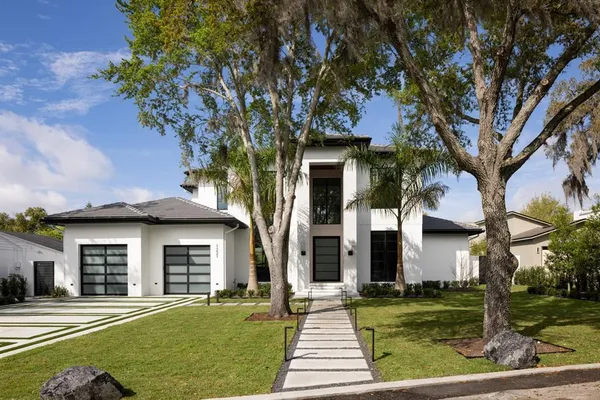 front view of a house with a yard