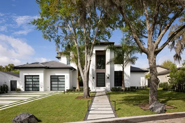 front view of a house with a yard