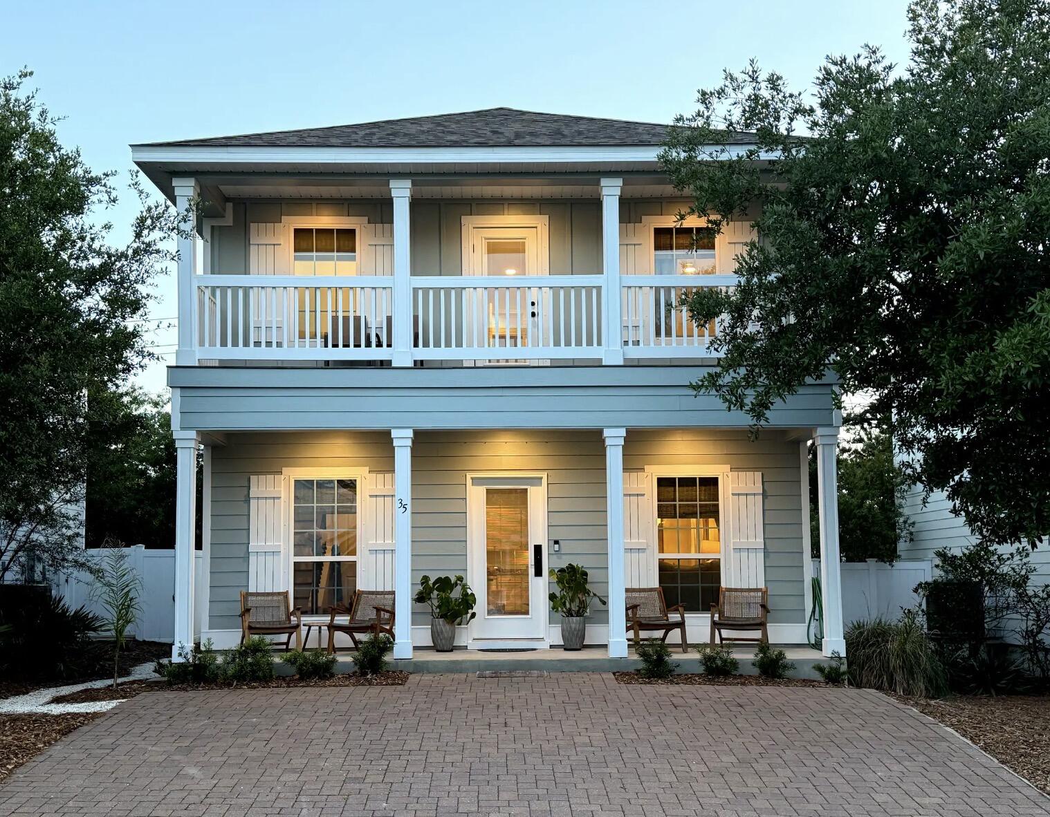 35 Grayling Way Inlet Beach, FL 32461 - Photo 1 of 4 a front view of a house with a garden