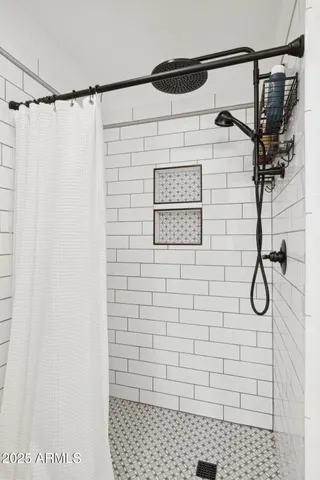 a bathroom with a shower curtain