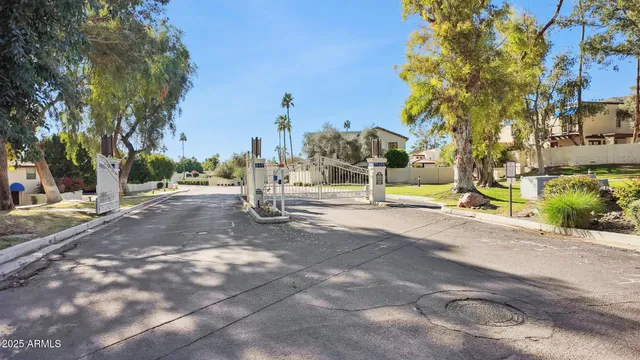 a view of a terrace with a table and chairs