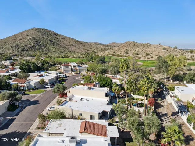 a view of a city and a mountain view