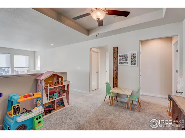 a room with furniture and wooden floor