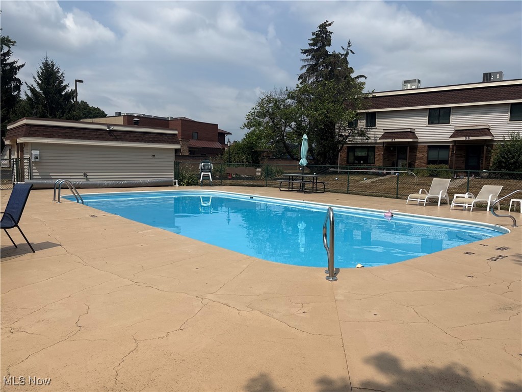 7050 Chillicothe Road, Unit B18 Mentor, OH 44060 - Photo 24 of 24 Community pool featuring a patio area