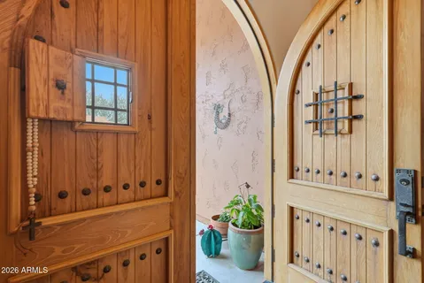 a view of a entryway with wooden floor