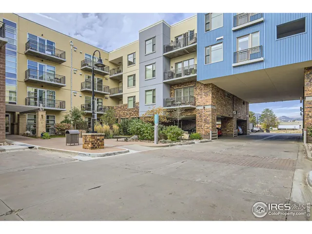 a view of a building with a street