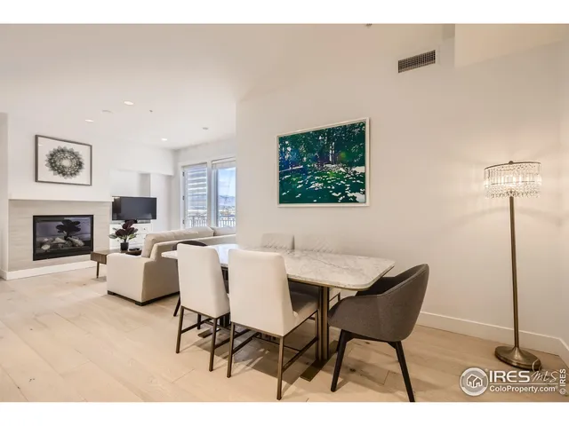 a view of a livingroom with furniture and a fireplace