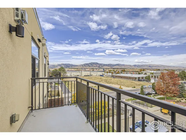 a view of city from a balcony