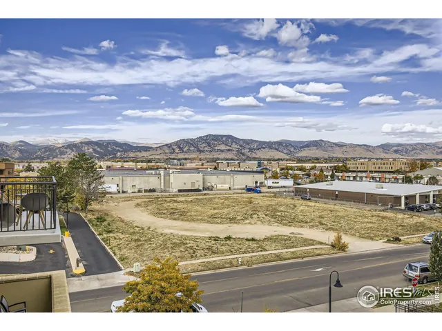 a view of a city with an ocean