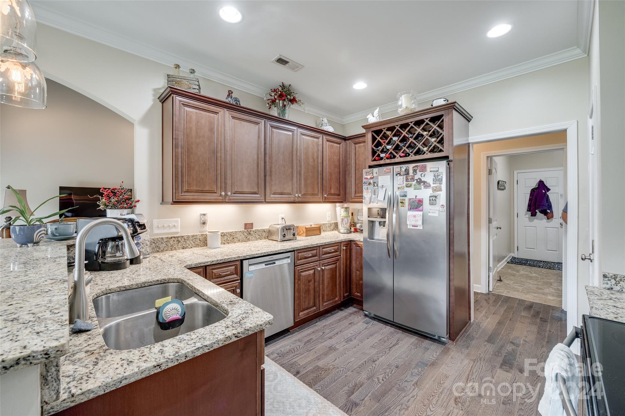 1946 State Rd S-46-168 York, SC 29745 - Photo 17 of 38 a kitchen with kitchen island granite countertop a sink stainless steel appliances and cabinets