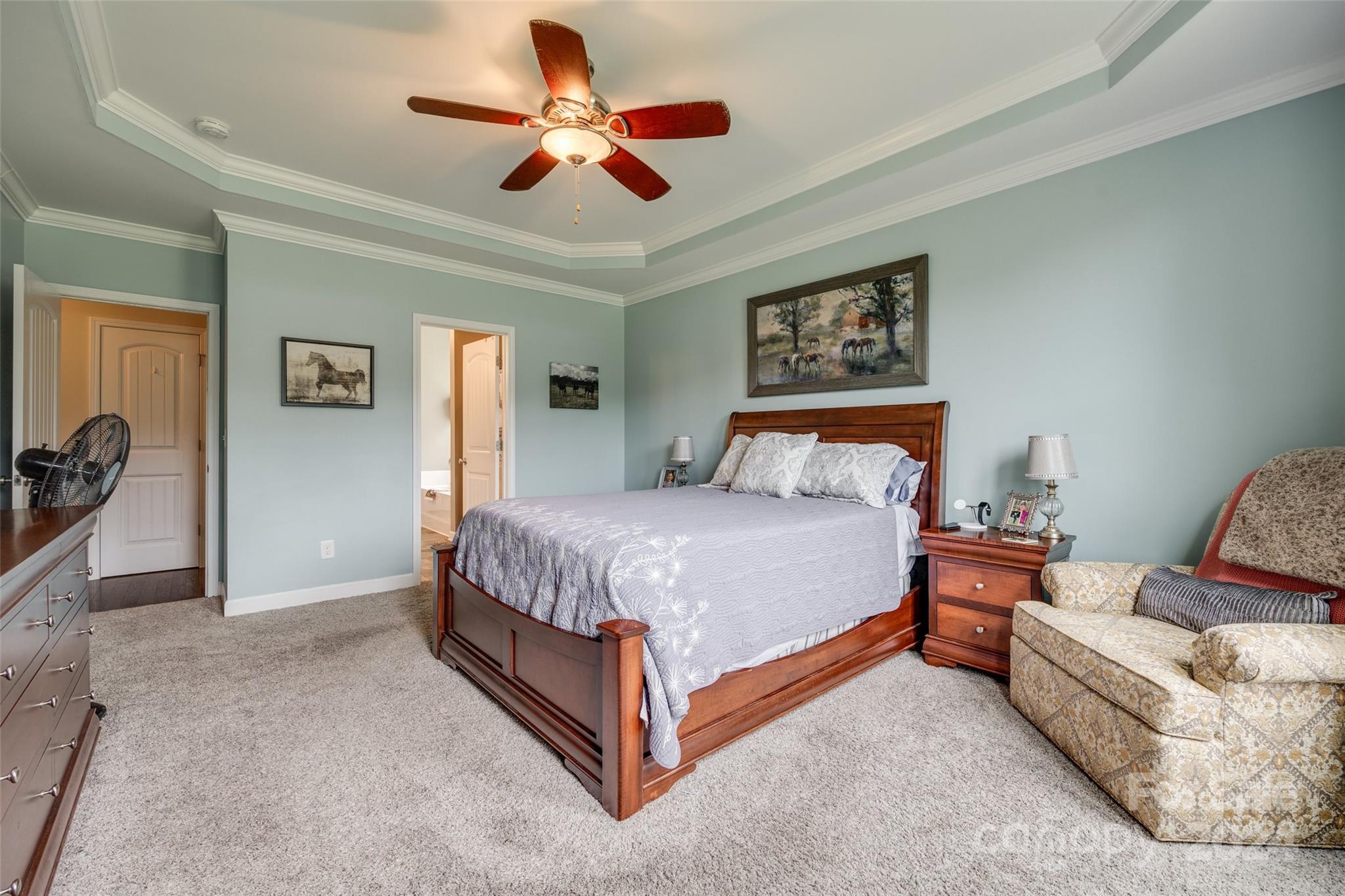 1946 State Rd S-46-168 York, SC 29745 - Photo 25 of 38 a bedroom with a bed and a chandelier