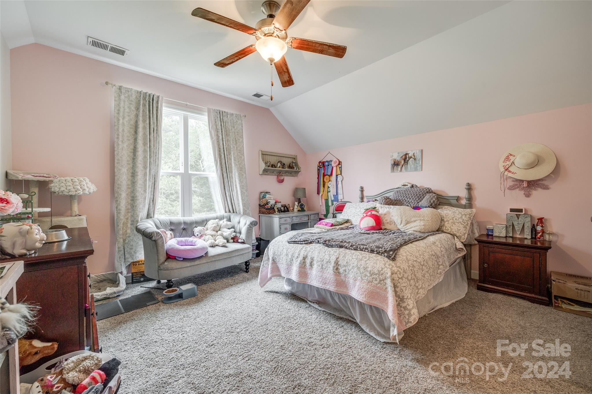 1946 State Rd S-46-168 York, SC 29745 - Photo 28 of 38 a bedroom with a bed and a chandelier