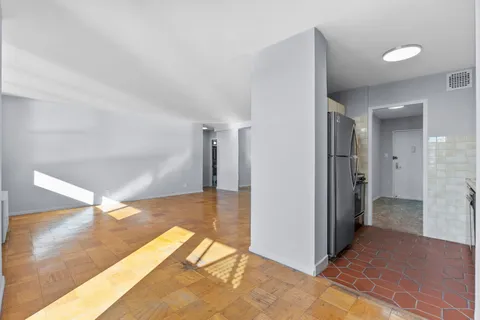 a view of a hallway view with staircase