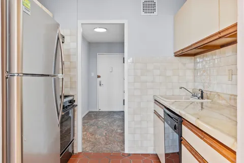 a bathroom with a sink and a shower