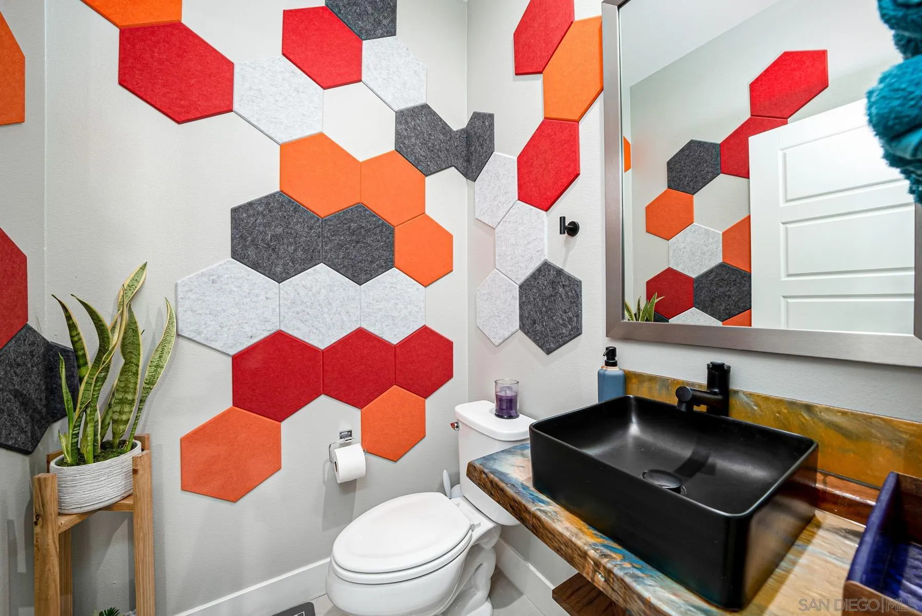 2854 Avella Circle San Diego, CA 92108 - Photo 11 of 31 a bathroom with a toilet sink vanity and curtain