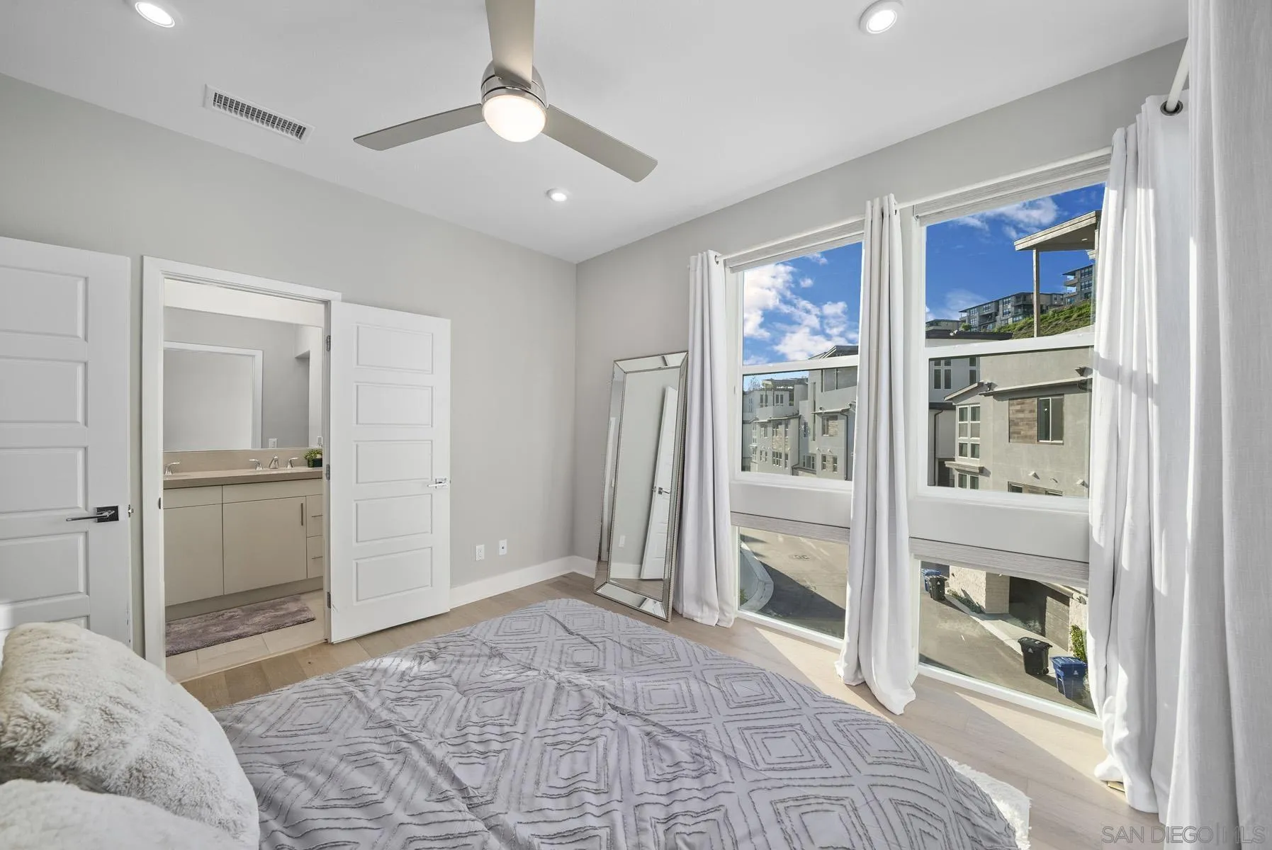 2854 Avella Circle San Diego, CA 92108 - Photo 12 of 31 a view of a bedroom with cabinet walk in closet and bedroom