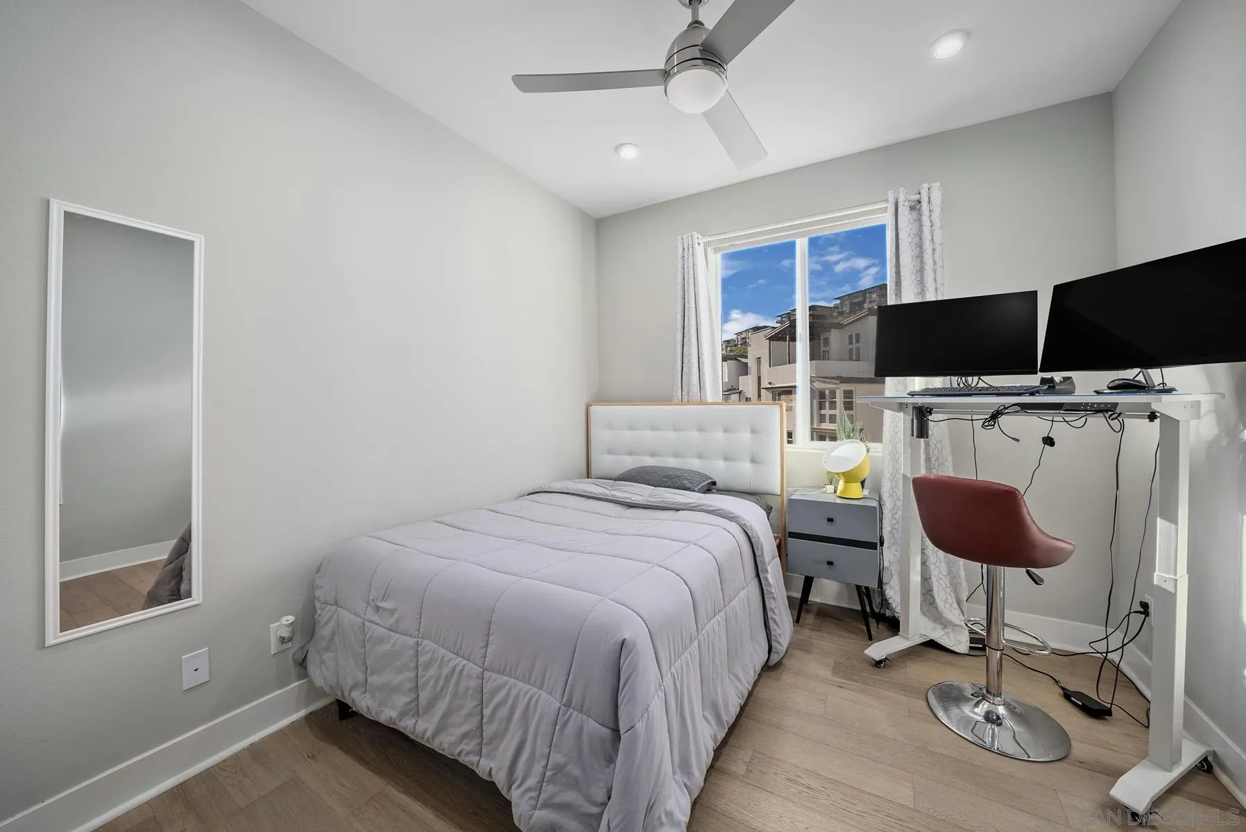 2854 Avella Circle San Diego, CA 92108 - Photo 16 of 31 a bedroom with a bed a flat screen tv and window