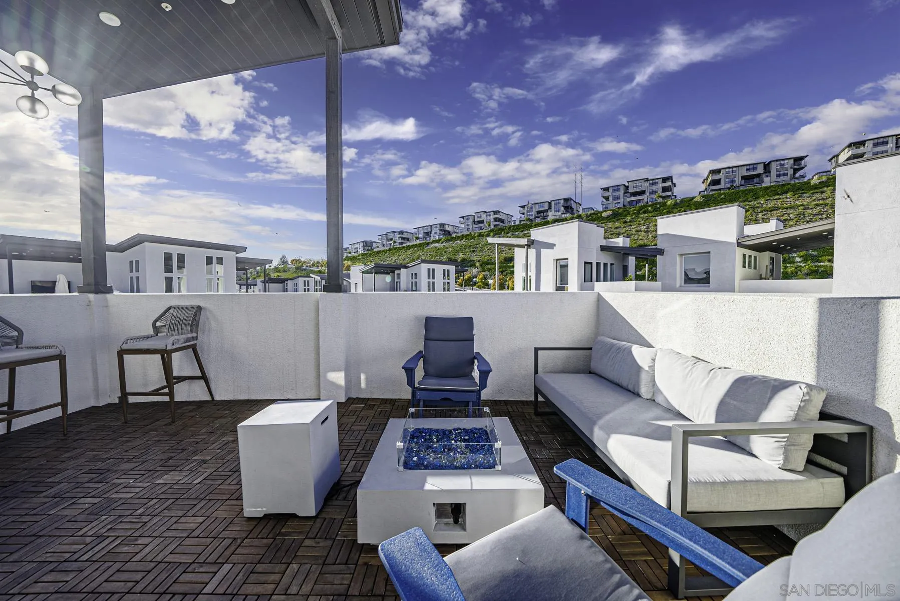 2854 Avella Circle San Diego, CA 92108 - Photo 20 of 31 a view of a patio with couches chairs dining table and chairs