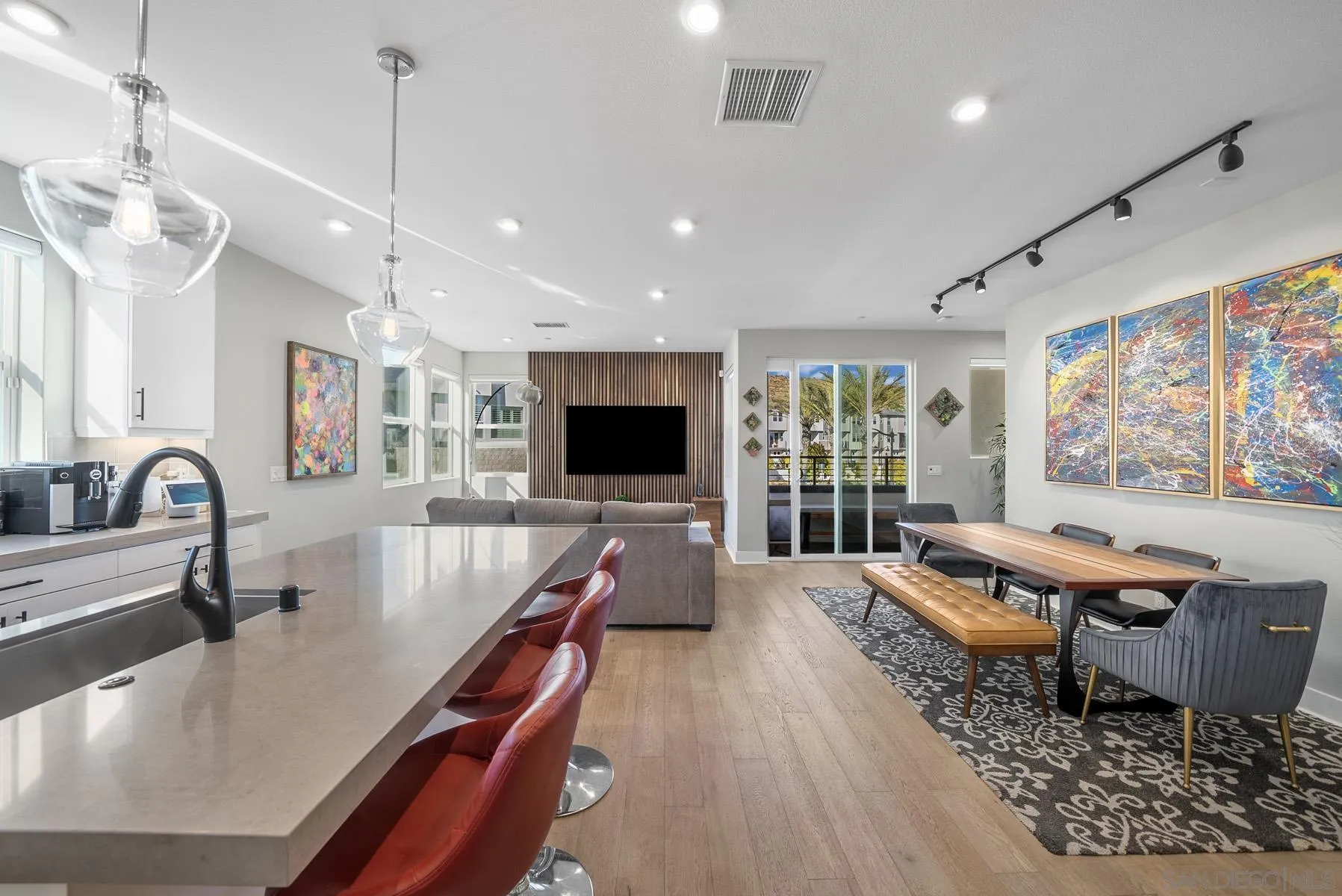 2854 Avella Circle San Diego, CA 92108 - Photo 2 of 31 a living room with furniture and a flat screen tv
