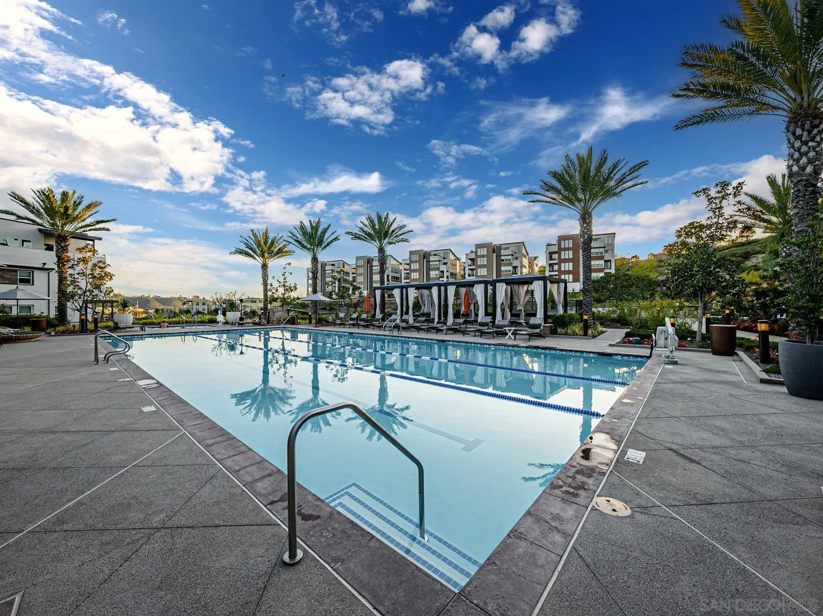 2854 Avella Circle San Diego, CA 92108 - Photo 24 of 31 a swimming pool with outdoor seating and yard