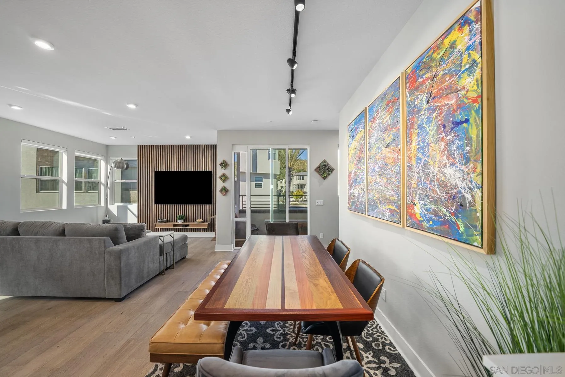 2854 Avella Circle San Diego, CA 92108 - Photo 8 of 31 a living room with furniture and a flat screen tv