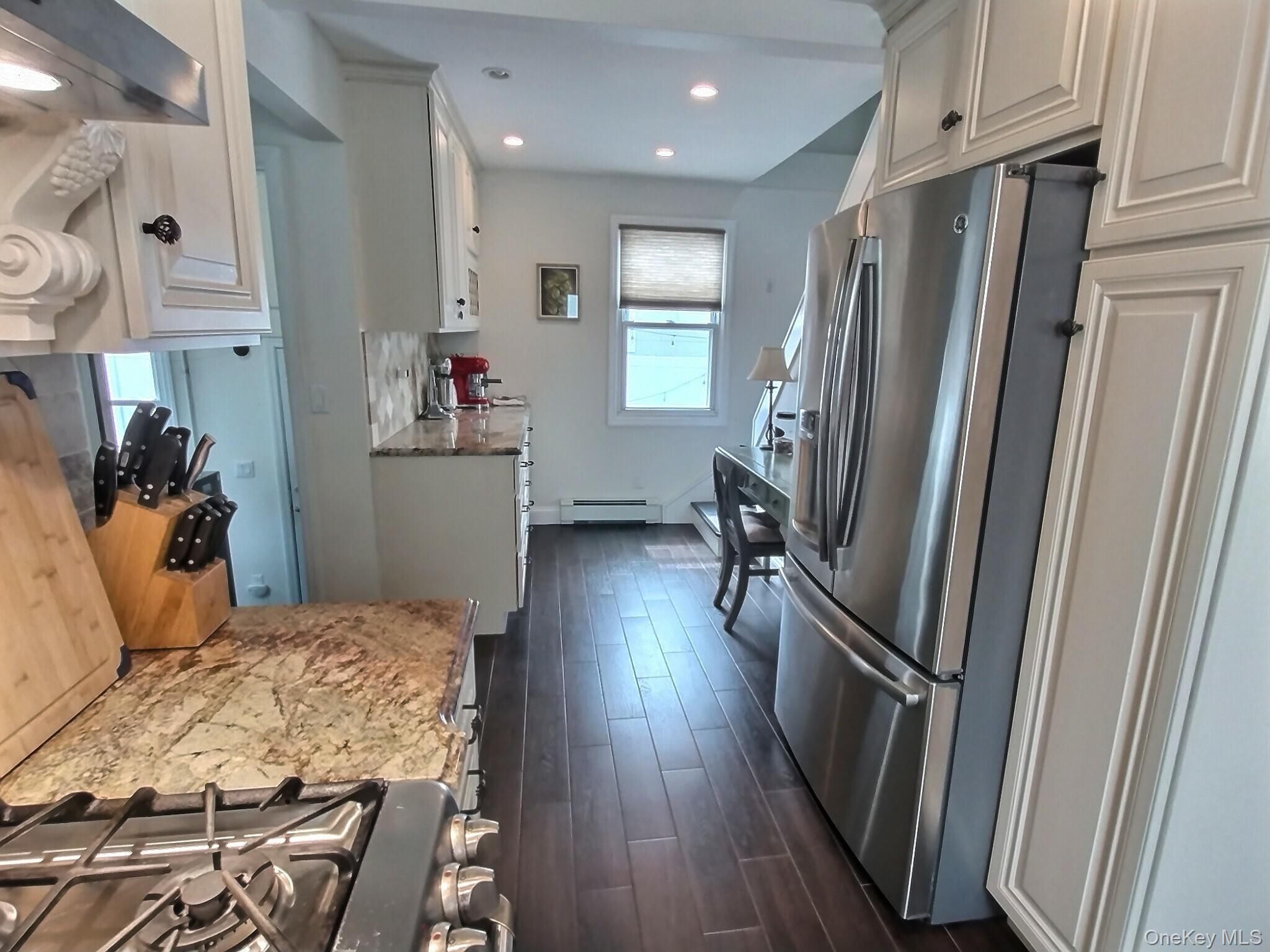 3037 Morrow Road Oceanside, NY 11572 - Photo 13 of 38 a bedroom with furniture and a wooden floor