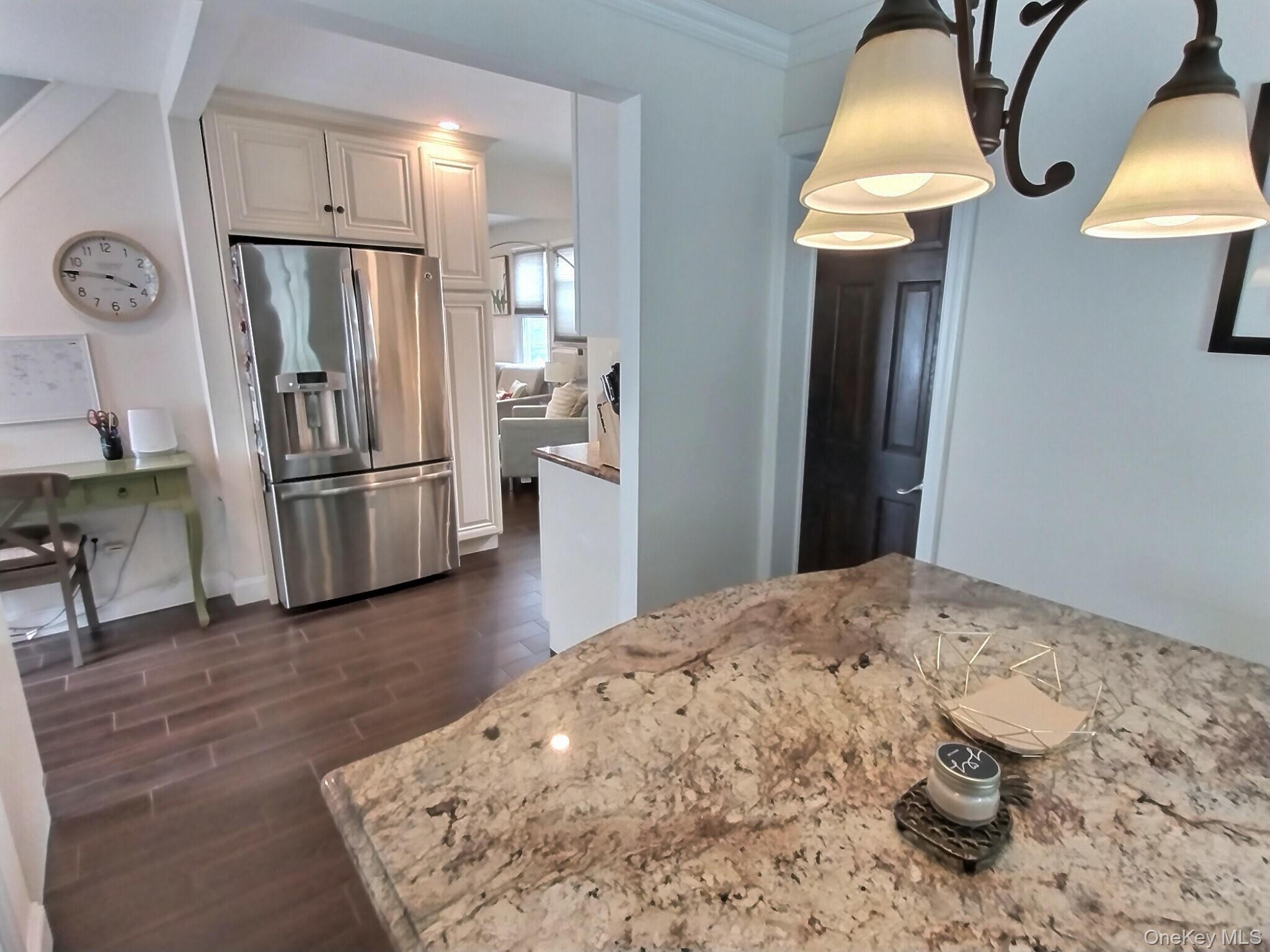 3037 Morrow Road Oceanside, NY 11572 - Photo 18 of 38 a kitchen with stainless steel appliances a refrigerator and a sink