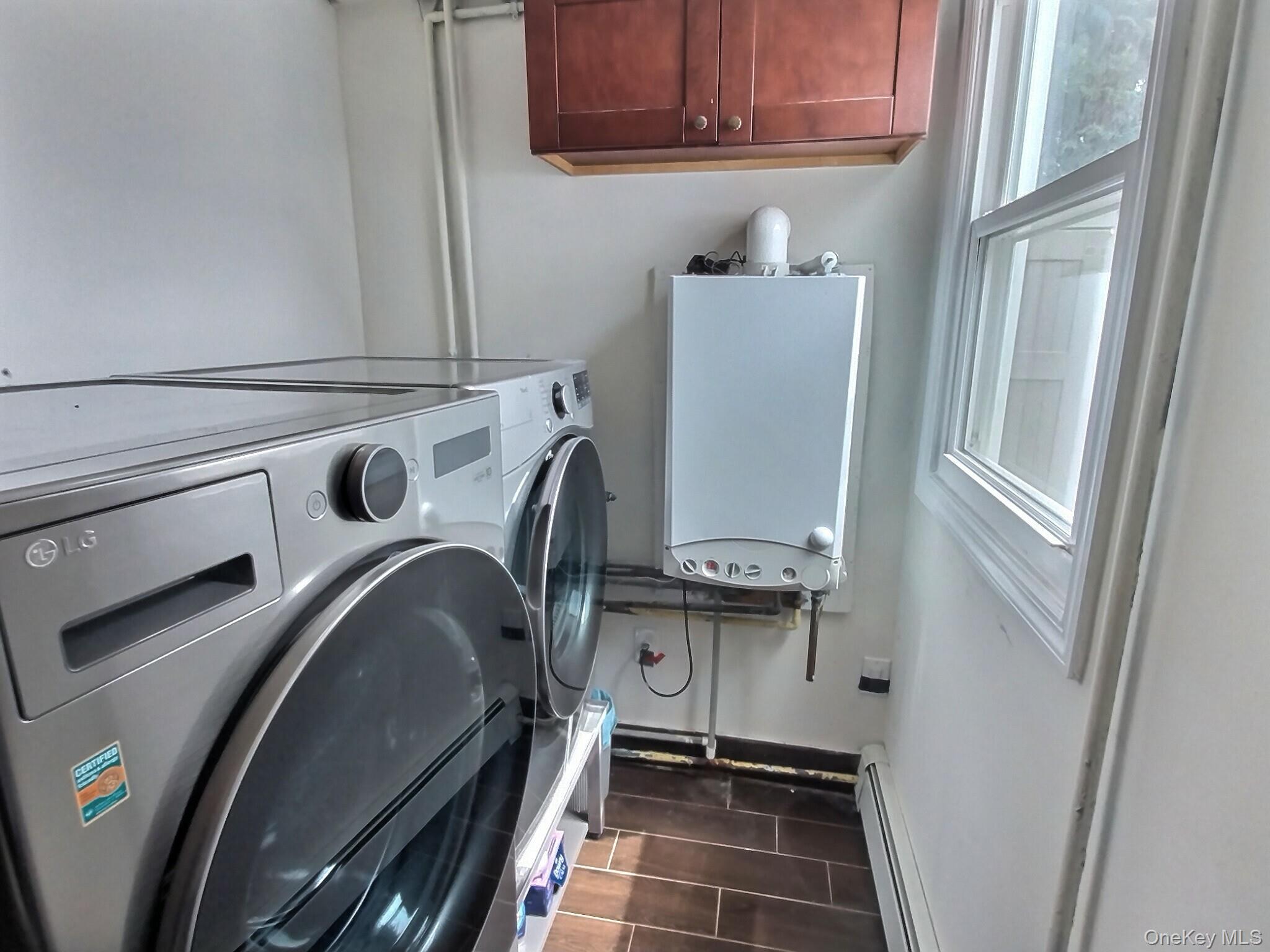 3037 Morrow Road Oceanside, NY 11572 - Photo 22 of 38 a utility room with dryer and washer
