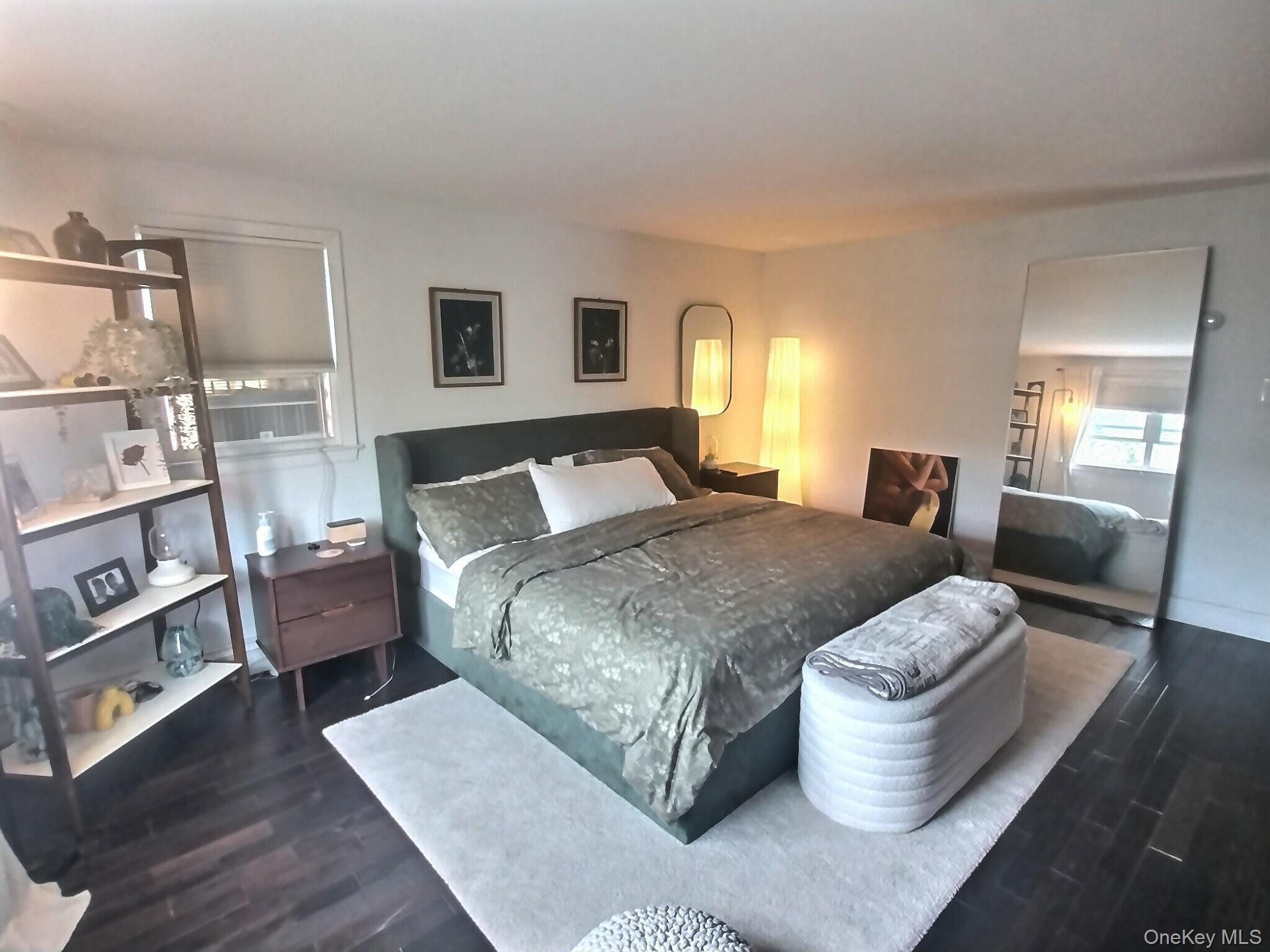 3037 Morrow Road Oceanside, NY 11572 - Photo 25 of 38 a spacious bedroom with a bed and window