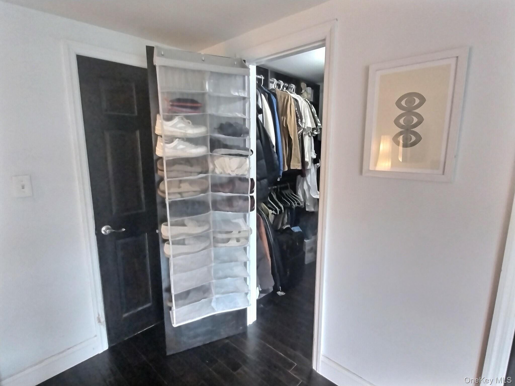 3037 Morrow Road Oceanside, NY 11572 - Photo 30 of 38 a view of walk in closet with clothes and shoes