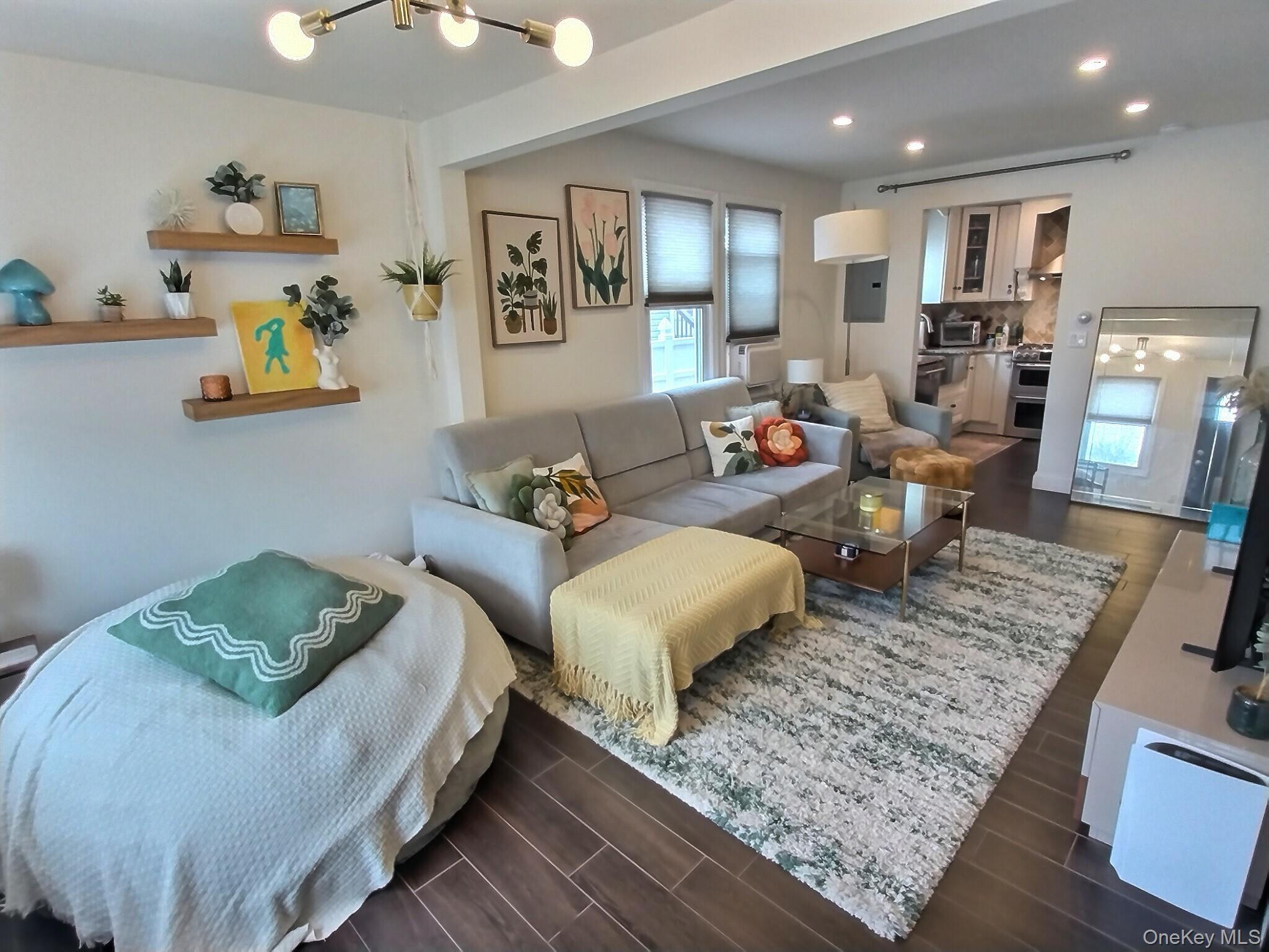 3037 Morrow Road Oceanside, NY 11572 - Photo 6 of 38 a living room with furniture and wooden floor