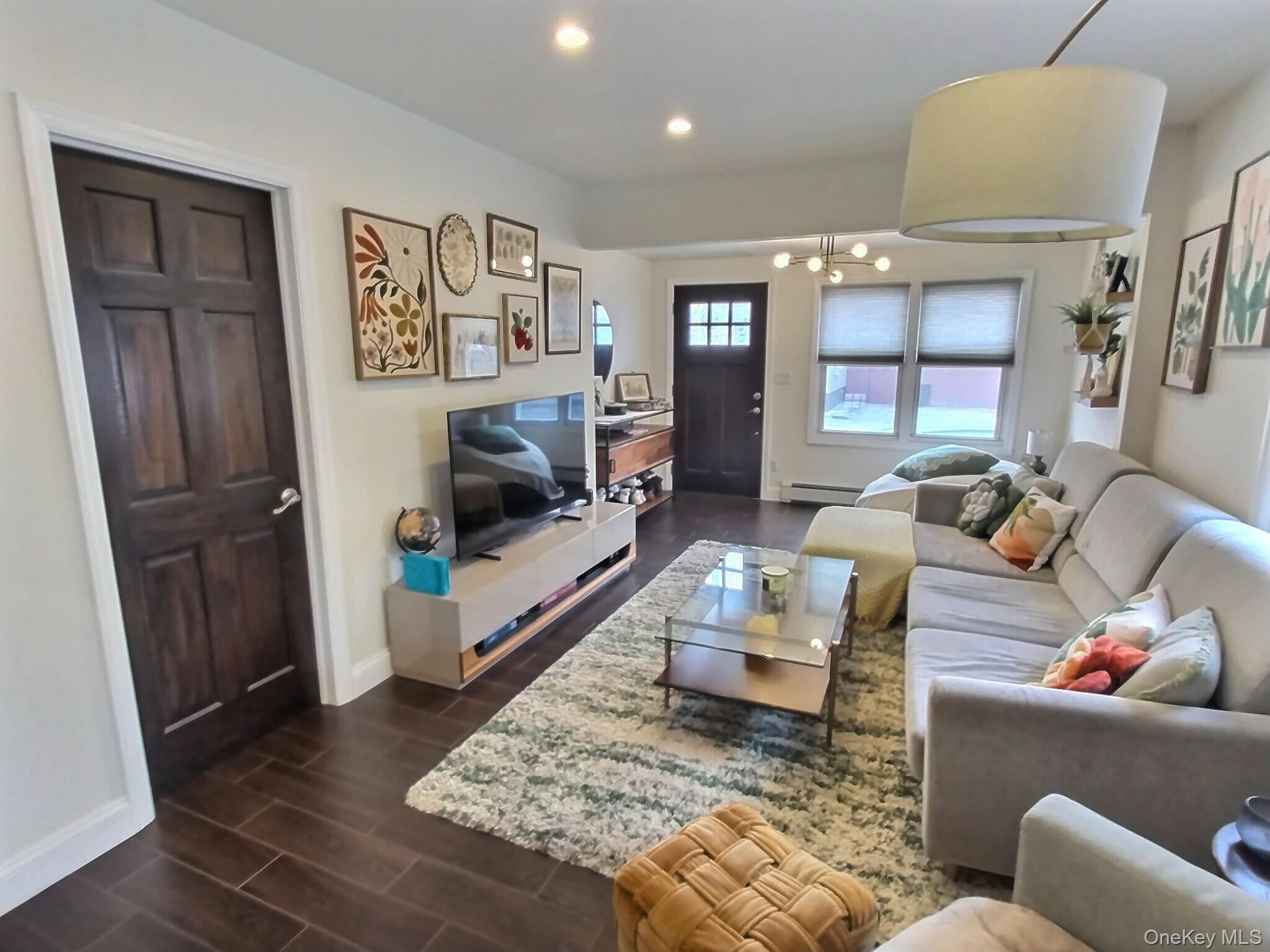 3037 Morrow Road Oceanside, NY 11572 - Photo 9 of 38 a living room with furniture and a window