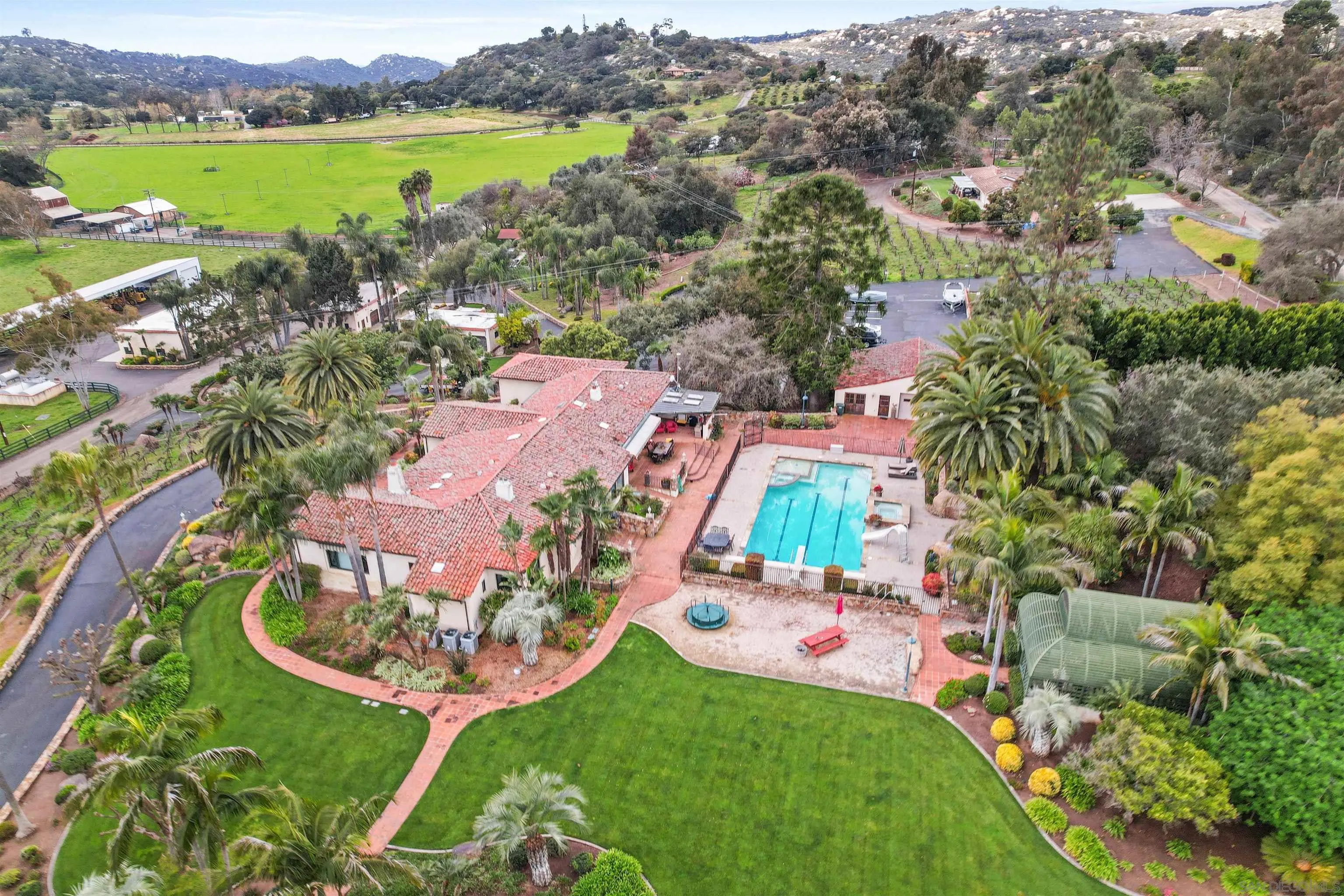16757 Old Guejito Grade Road Escondido, CA 92027 - Photo 1 of 38 an aerial view of a houses with outdoor space and a lake view