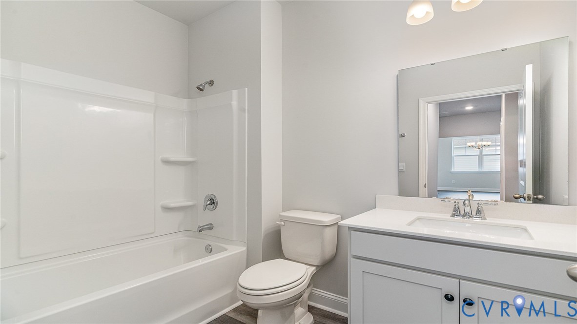16806 Barmer Road Chesterfield, VA 23832 - Photo 15 of 39 a bathroom with a sink toilet and bathtub