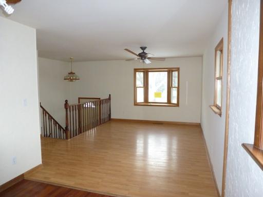 612 Springbrook Drive Aurora, IL 60506 - Photo 3 of 7 a view of livingroom with hardwood floor and window