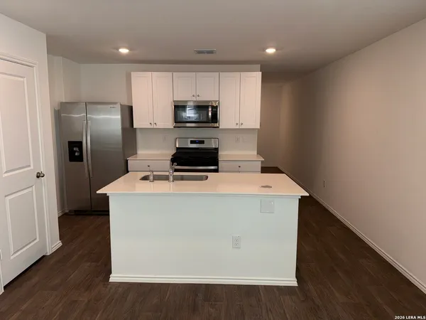 a utility room with washer and dryer
