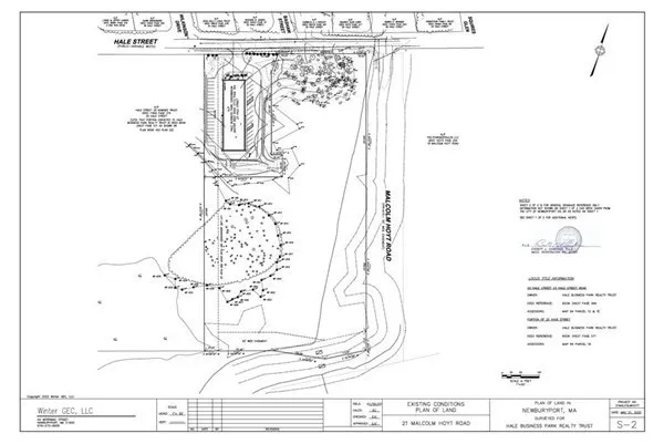 a picture of a room with a bench and potted plant