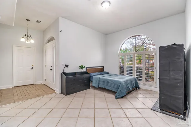 a kitchen with cabinets stainless steel appliances and a counter top space