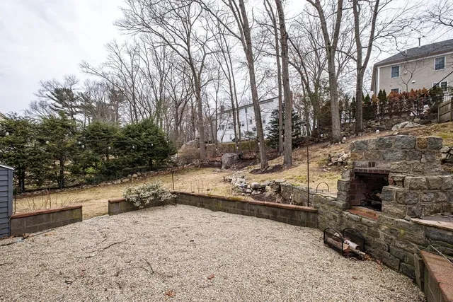 a view of a yard with snow on the road