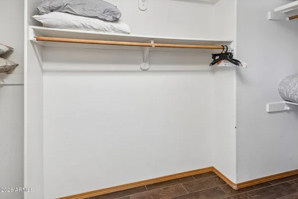 a workspace with furniture window and wooden floor