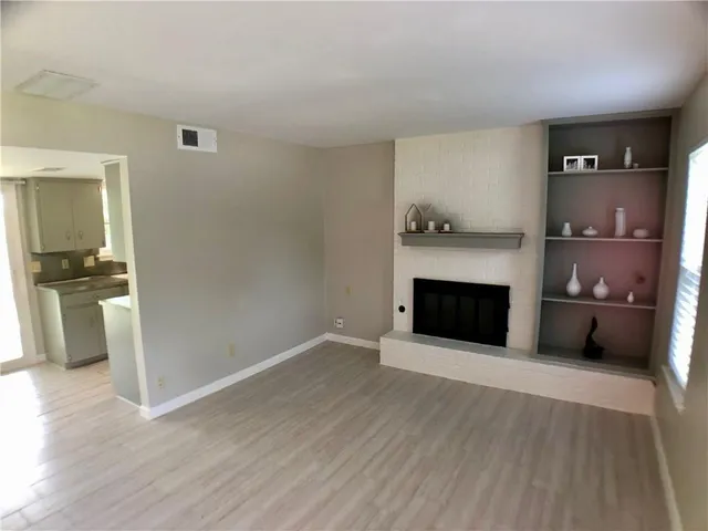 a view of a livingroom with a fireplace