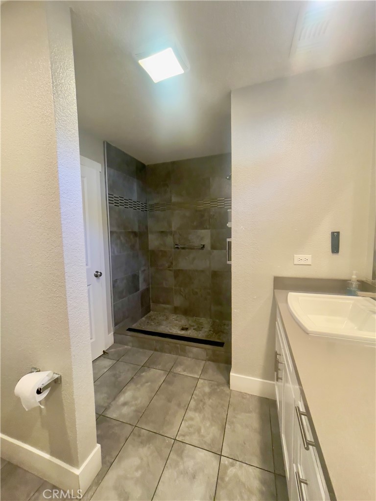 8317 Keyesport Way Citrus Heights, CA 95610 - Photo 17 of 28 a bathroom with a shower and a sink