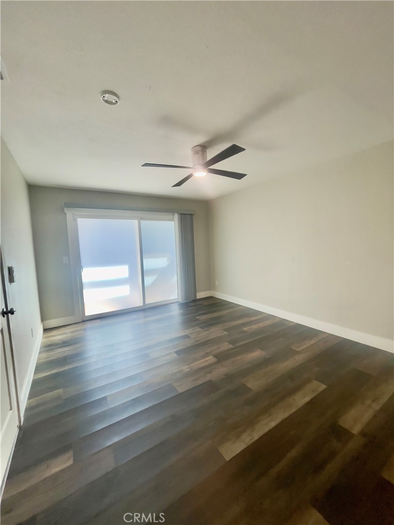 8317 Keyesport Way Citrus Heights, CA 95610 - Photo 21 of 28 a view of empty room with wooden floor and fan