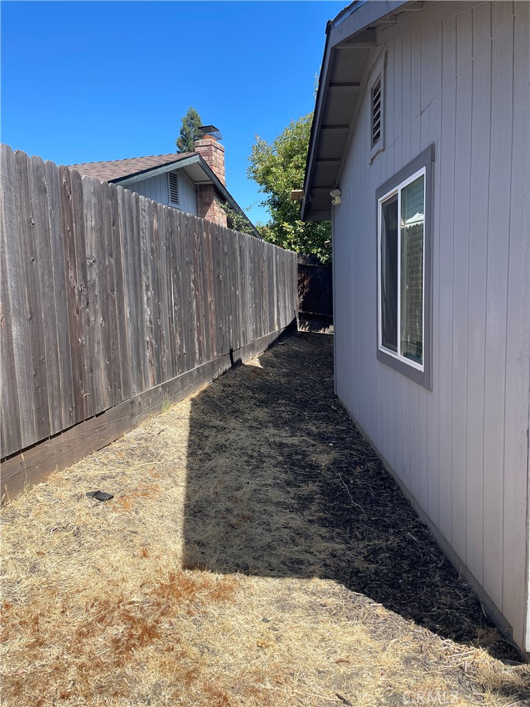8317 Keyesport Way Citrus Heights, CA 95610 - Photo 25 of 28 a view of a pathway of a house with wooden fence