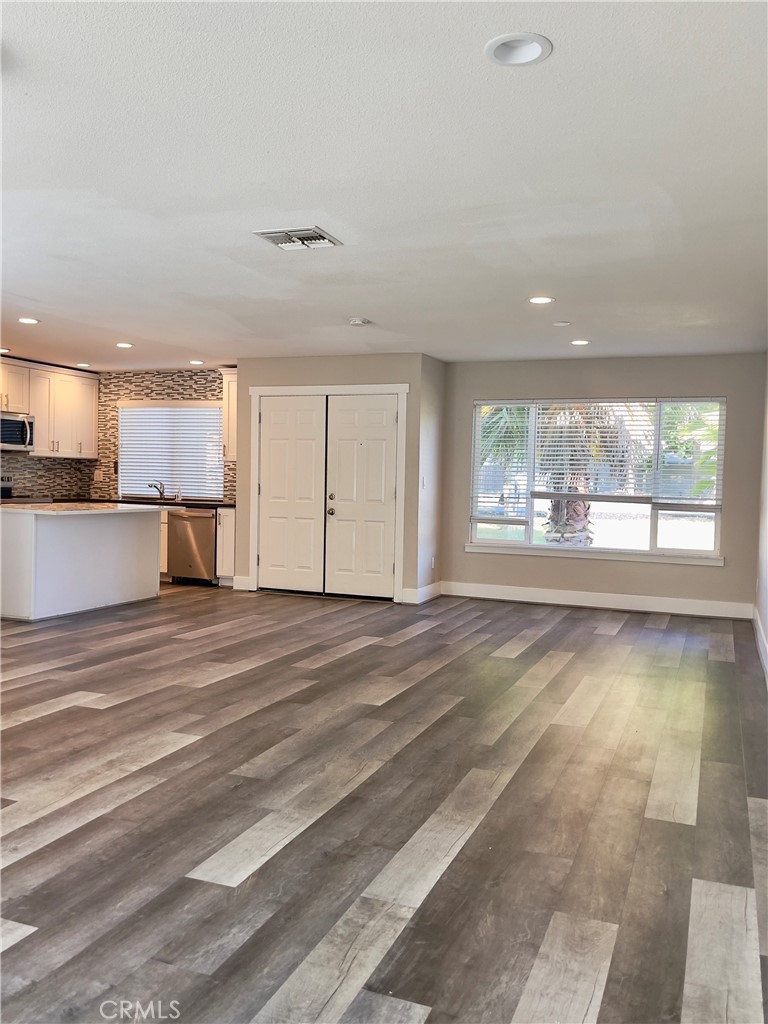 8317 Keyesport Way Citrus Heights, CA 95610 - Photo 3 of 28 an empty room with a kitchen view and a window