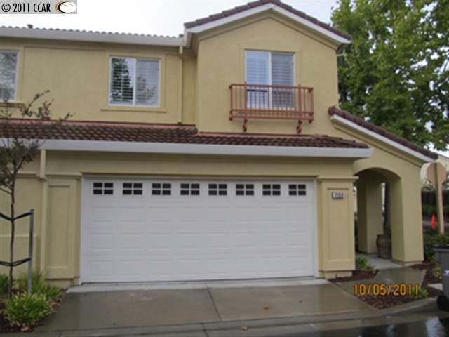 7098 Briza Loop San Ramon, CA 94582 - Photo 1 of 1 a front view of a house with a yard